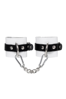 Бело-черные кожаные наручники с одним ремешком с люверсами
