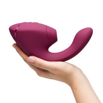 Вибратор с вакуумно-волновой стимуляцией клитора Womanizer Next Duo розовый